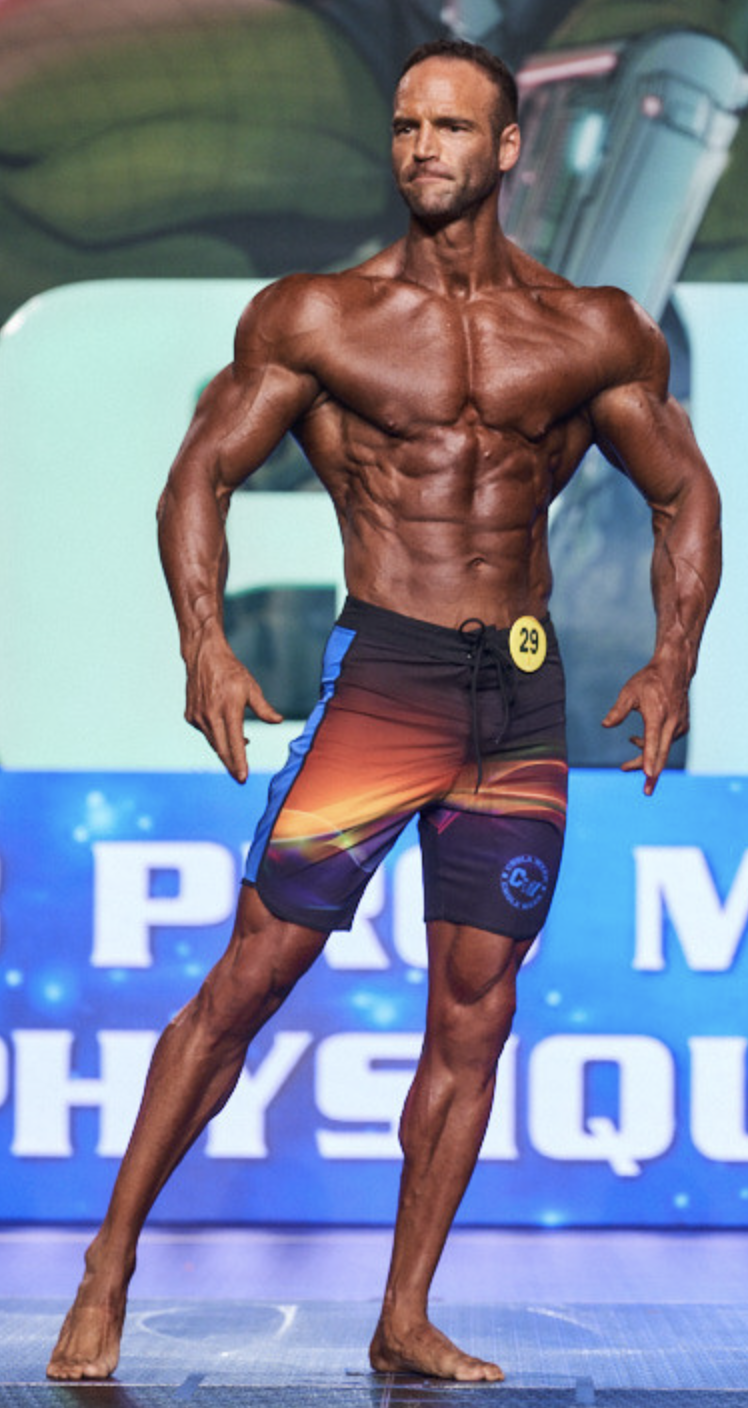 Men's Physique athlete, front pose